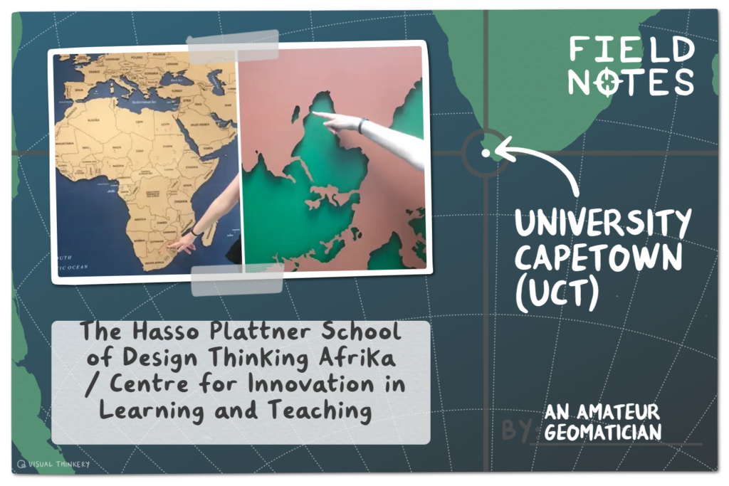 Cara points at two maps. The conventional map is located the entrance of the The Hasso Plattner School of Design Thinking Afrika. The upside down map, with a negative shape is located at CLTD. Both use the mercator projection.